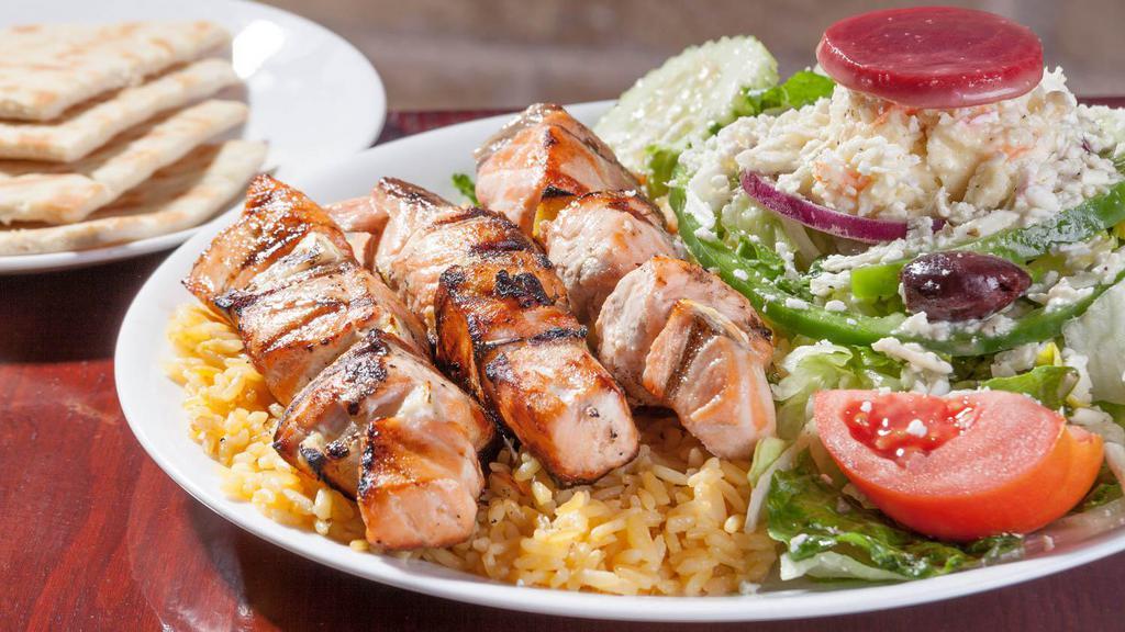 Grilled Salmon · Char-grilled salmon over rice.