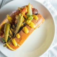 Shy Dog · Our version of a taste of Chicago! An all-beef frank topped with neon relish from Chicago, y...
