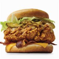 Crispy Chicken Deluxe Sandwich · Includes: lettuce, bacon, cheese, pickles and honey mustard on a toasted bun.