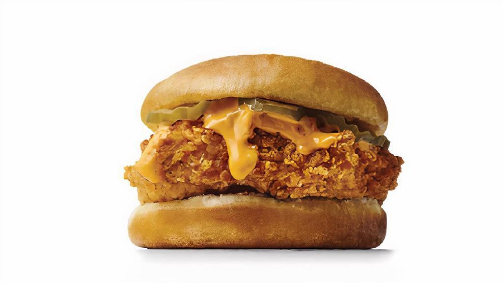Spicy Crispy Chicken Sandwich · Includes: Boom Boom sauce and 2 pickles on a toasted bun.