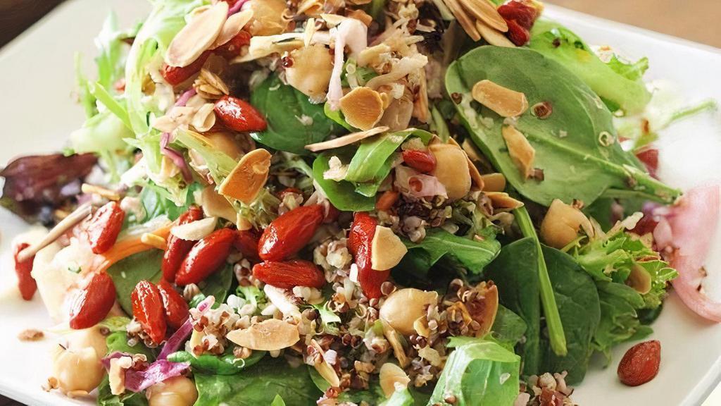 Power Salad · Salad medley, cabbage, goji berries, pickled onions, almonds, toasted sunflower seeds, quinoa, chickpeas, hemp seeds, cashew truffle dressing