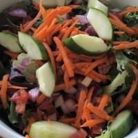 Side Salad · Side Salad with Lettuce, Cucumber, Onion, Tomato and Carrots or a Caesar Salad with Banana B...