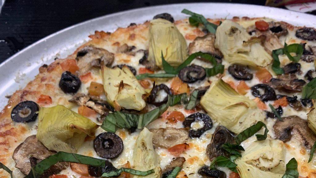 Veggie Pizza · 12 in. cheese pizza topped with mushrooms, olives,banana peppers, jalapenos, bell peppers, and onions       ***some items may not be available