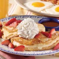 Stuffed Cheesecake Pancake Breakfast · Our classic homestyle buttermilk pancakes stuffed with creamy cheesecake filling and topped ...