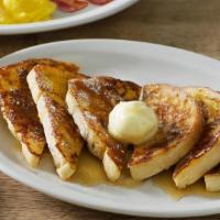 Momma'S French Toast Breakfast® · Six pieces of our Sourdough bread hand-dipped in eggs and grilled, topped with butter and se...