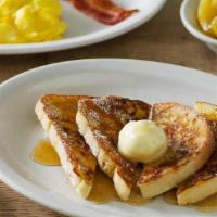 Grandma'S Sampler French Toast Breakfast · Four pieces of our Sourdough bread grilled and topped with butter, two eggs* and a sampling ...