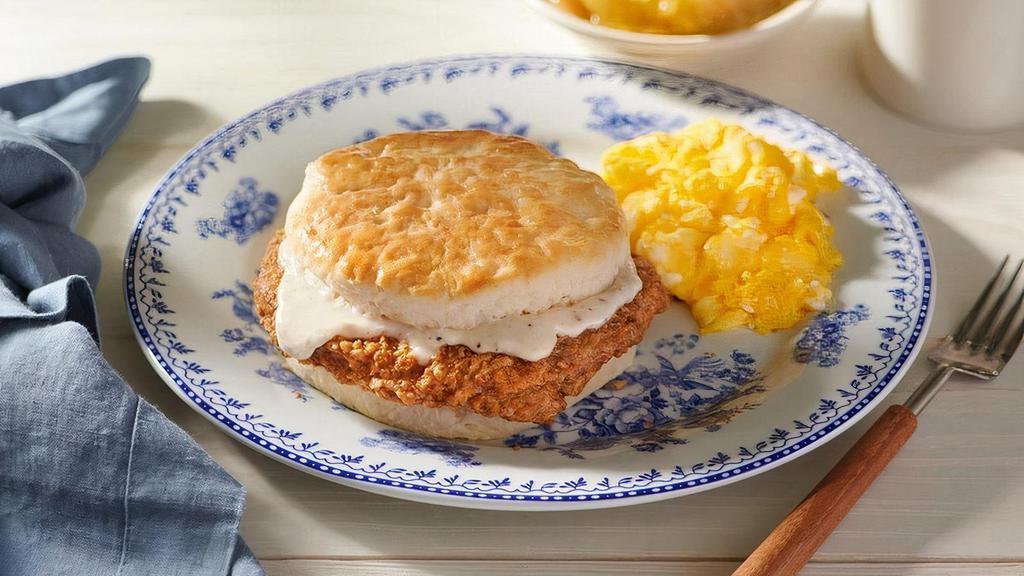Country Fried Steak Biscuit Breakfast · Our crispy Country Fried Steak on an oversized Buttermilk Biscuit, topped with Sawmill Gravy. Served with choice of Breakfast Side and two eggs*.