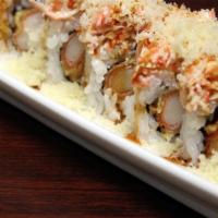 Krispy Crab · Crab stick tempura topped with crab salad, tempura flakes and eel sauce.