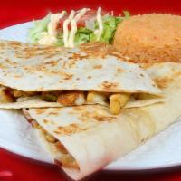 Quesadilla · Flour tortillas with mozzarella cheese and meat of your choice. Served with Mexican rice and...