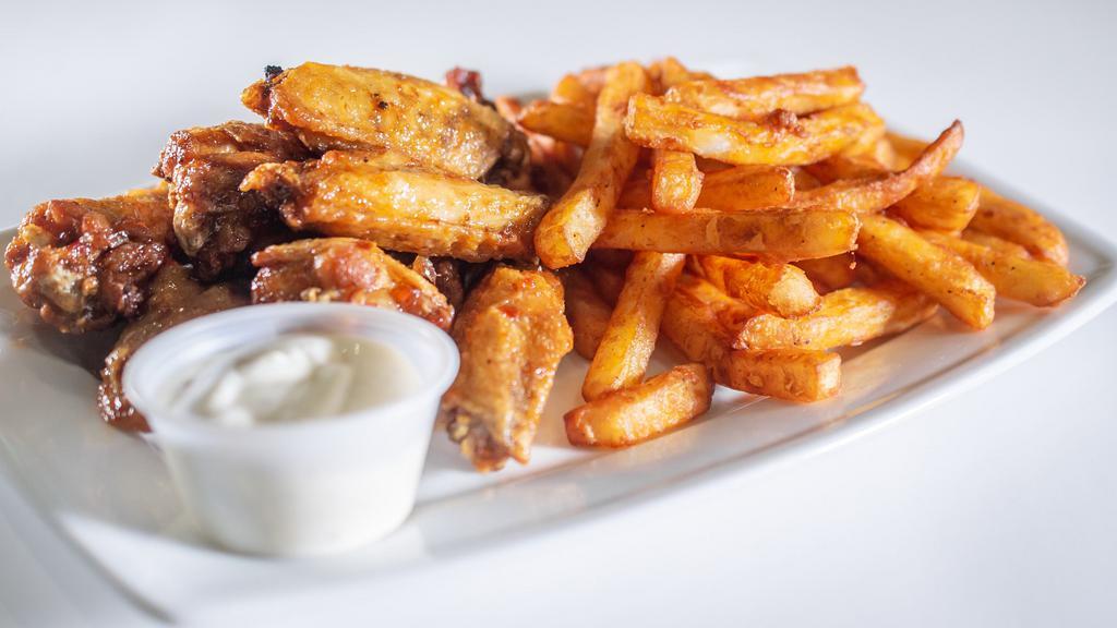 Chicken Wings · Served with seasoned fries. Your choice of flavor: Hot, Regular Barbecue, Sweet Chilli, Lemon Pepper
