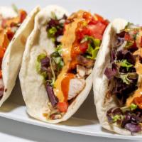 Tacos · Served with seasoned fries. Your choice of protein: 
Beef,
Chicken, 
Shrimp,
Suya,
Salmon