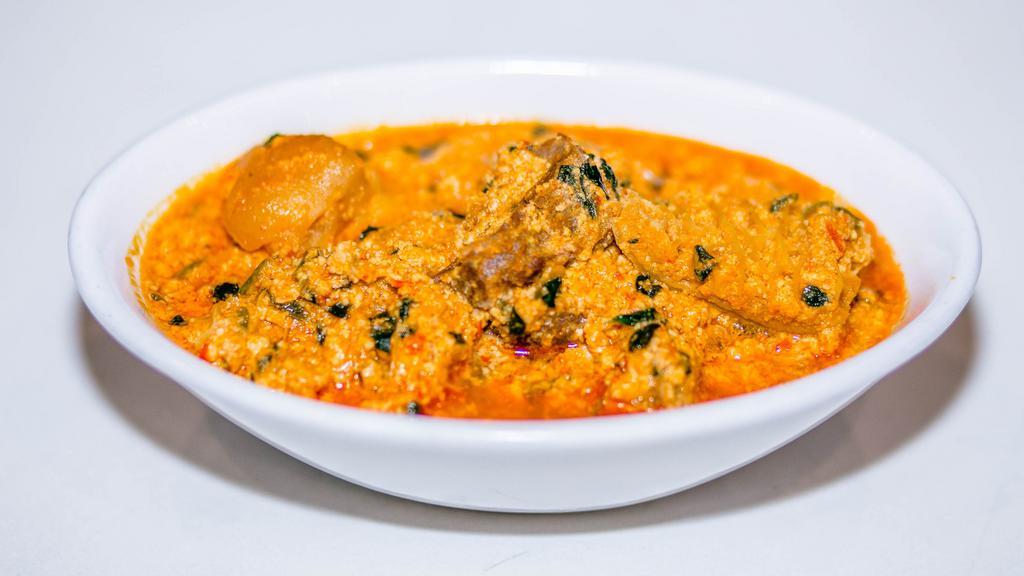 Egusi · Ground melon seeds cooked in a delicious sauce with meats.