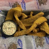 Flounder Fingers(Cal 560) · Hand-breaded Flounder strips fried to perfection with a house-made chipotle tartar dipping s...