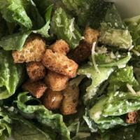 Small Caesar Salad(Cal 240) · Crisp romaine lettuce topped with shredded Parmesan cheese and croutons. Served with our hou...