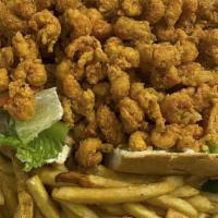 Crawfish Po Boy (Cal 1000) · Dressed with mayonnaise, lettuce, pickles and tomatoes and served with French Fries