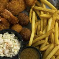 Coconut Shrimp Basket (Cal 840) · Hand Battered and Slightly Fried, served with our signature shrimp slaw, two 
Hush-puppies, ...