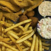 Flounder Basket · Handbattered and lightly fried, served with our signature shrimp slaw, two hushpuppies, a co...