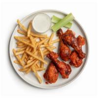 Five Crispy Drumsticks · Served with 1 side, celery, and choice of blue cheese or housemade ranch dressing.