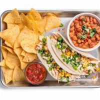 Elote Chicken Taco Plate · Two tacos (1 flavor) containing chicken, aji verde, street corn, and fresh jalapenos. Served...