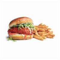 Buffalo  · Breaded rotisserie chicken breast, flash-fried and tossed in tangy buffalo sauce, topped wit...