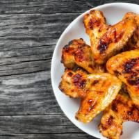 Mild Wings (10 Pieces) · Fresh oven-baked mild flavored chicken wings. Choice to make it crispy! Free Ranch or Bleu C...