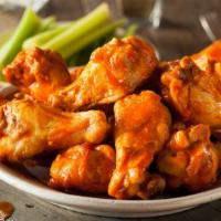 Hot Wings · Fresh oven-baked hot flavored chicken wings. Choice to make it crispy! Free Ranch or Bleu Ch...