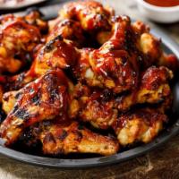 Bbq Wings (5 Pieces) · Smothered in sweet BBQ sauce chicken wings. Choice to make it crispy!