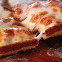 X-Large Cheese Pizza · 12 pcs. Build your own Detroit-Style Pizza topped with premium mozzarella & your choice of t...