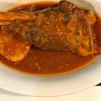 Lamb Shank · Marinated and slow-cooked in tomato sauce