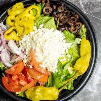 Greek Salad · Greens, feta, black olives, banana peppers, red onion,. Tomatoes.