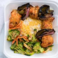 Chicken Shish Kabob · Chicken tenders marinated and grilled with onions and green peppers.