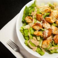 Caesar Salad · Crisp romaine
lettuce with homemade
dressing & croutons topped
with grated cheese.