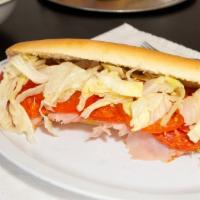 Italian (Full) · hot or cold. Ham, capicola, pepperoni, provolone, lettuce, tomato, onion, and layered with h...