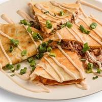Smokehouse Quesadilla · Filled with cheese, charred red onions, Wickles Pickles, Dreamland BBQ Sauce, & stuffed with...