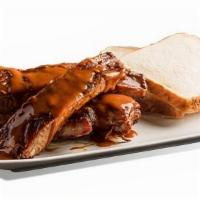 Rib Sandwich · Served fresh off the pit with sliced white bread.