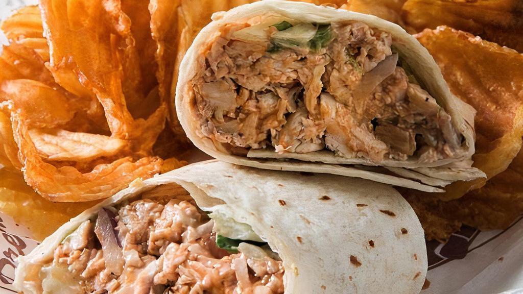 Bbq Chicken Wrap · Chicken, lettuce, tomatoes, onions, cucumber, Monterey Jack, and cheddar cheeses. Tossed in ranch & wrapped in a flour tortilla.