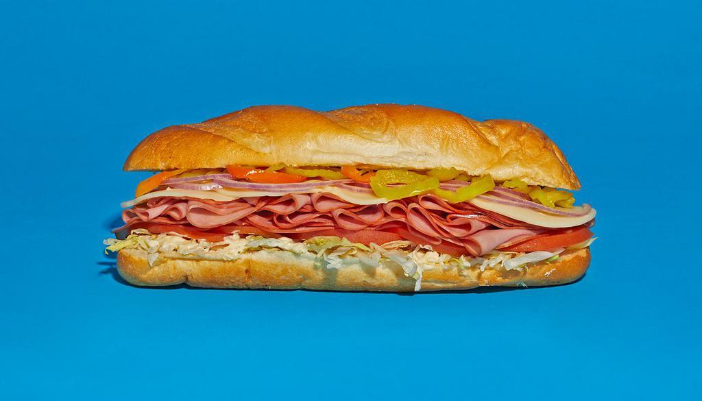 Ham And Cheese Hoagie · Sliced ham with tomato, red onion, lettuce, mayo, and provolone on a hoagie roll.