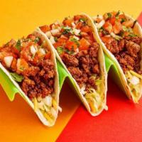 Beyond Meat Tacos · 3 tacos with plant-based Beyond Meat, cheese, lettuce, pico de gallo and your choice of sauce.