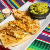 Quesadilla · Flour tortilla stuffed with melted mozzarella cheese and chicken or steak or al pastor camar...