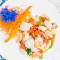 Seafood Delight · Lobster meat, scallop, jumbo shrimp and crab meat with mixed vegetable sautéed in white sauce.