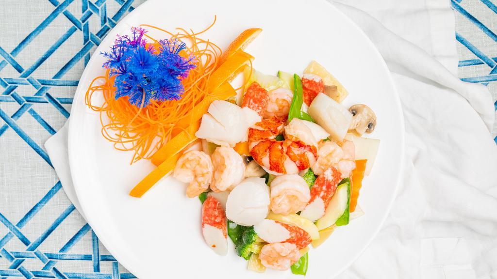 Seafood Delight · Lobster meat, scallop, jumbo shrimp and crab meat with mixed vegetable sautéed in white sauce.
