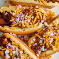 Chili Cheese Dogs (2) · 2 All beef hotdogs on a toasted bun , topped with freshly made Turkey chili, cheese, and gri...