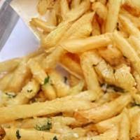 Flavor Fries · Our fries tossed in sauce.
