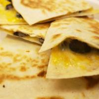 Chihuly Quesadilla · Toasted black bean and corn tossed in a creamy jalapeño sauce (mild), shredded cheese and si...