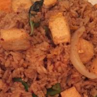 Spicy Basil Fried Rice · Medium spicy. Basil leaves, onion, bell pepper, and egg.