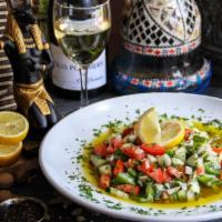 Egyptian Salad · Salata baladi - is a must on every Egyptian table made with tomatoes, cucumbers, onions and ...