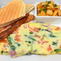 Omelette · 3 egg omelet with your choice of 3 ( ham, spinach, tomato, peppers, mushrooms and cheese) wi...