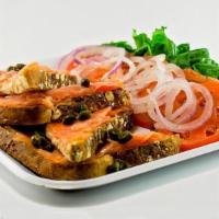 Nova Salmon Plate · Toast multigrain bread with cream cheese, topped with Nova Salmon . Served with a side of le...