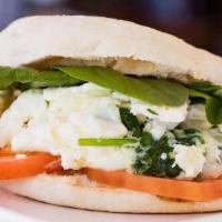 Healthy White · Egg whites tortilla with spinach. Served on tasted English muffin with 2 fresh slices of tom...