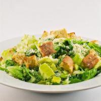 Caesar Salad · Fresh romaine lettuce, shaved Parmesan cheese, croutons served with Caesar dressing.